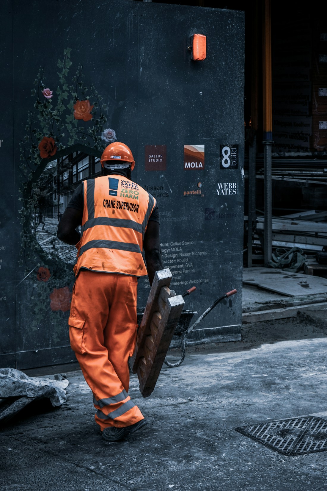 Worker handling materials in an industrial workshop