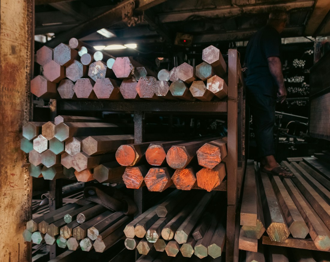 Metal rods stacked in storage